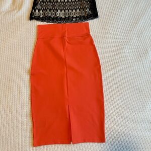 Fitted orange bodycon skirt and matching spaghetti strap crop top